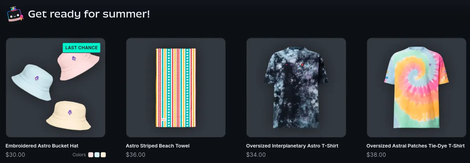 Una fila de merch de Astro con temática de verano, incluyendo gorros pastel estilo bucket, una camiseta teñida y una colorida toalla de playa.